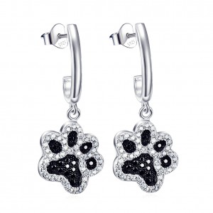 Silver dog paw earrings with black and white zirconia stones