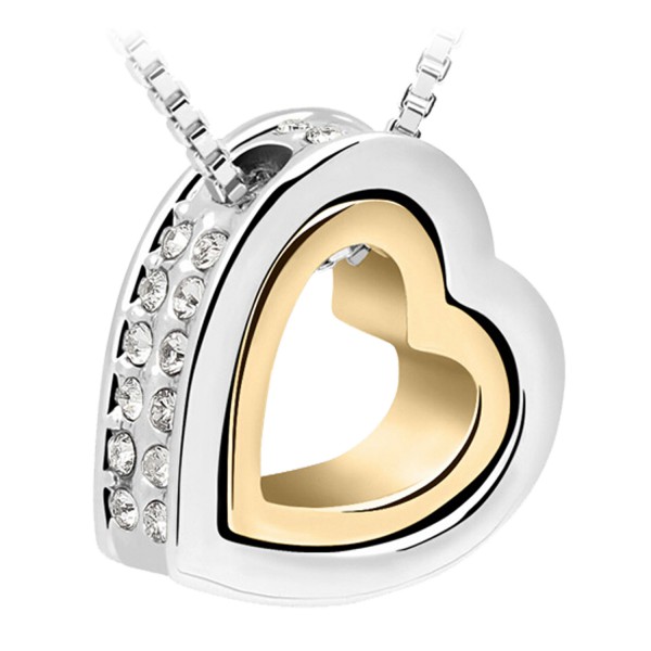 Silver heart with golden heart inside & crystals on the outside